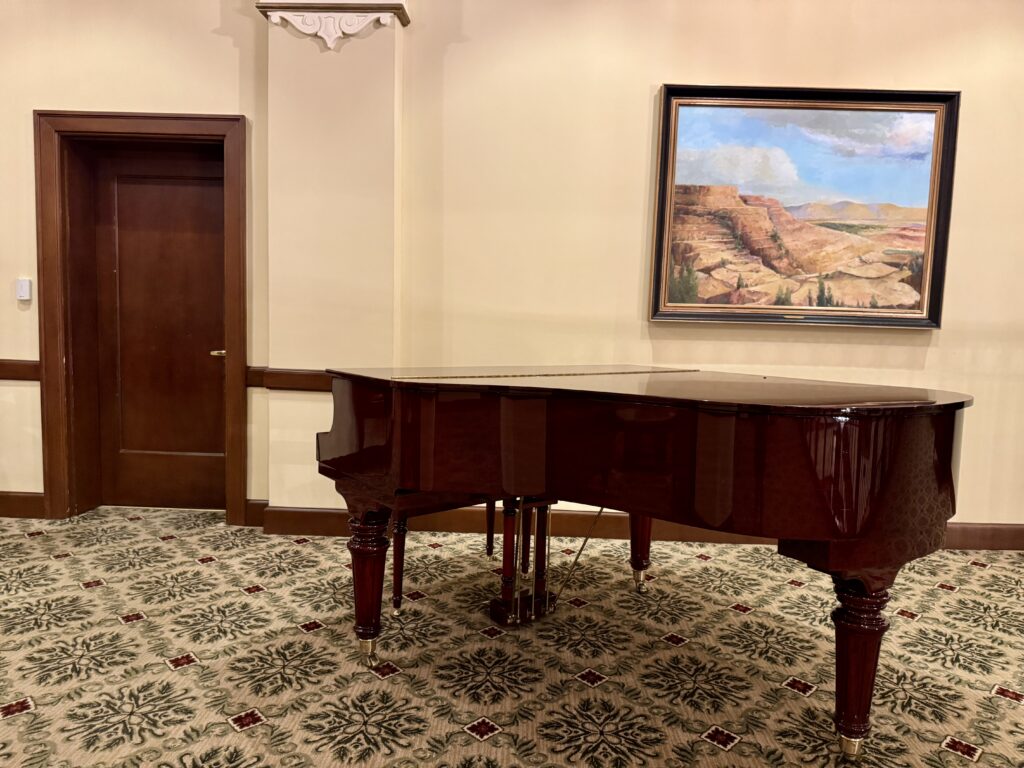 A solitary piano in the Hotel Settles of Big Spring, Texas.